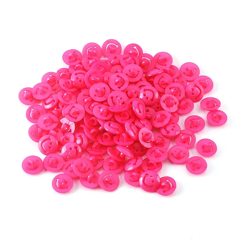 Lyserød smily face plastikknap med, 15 mm